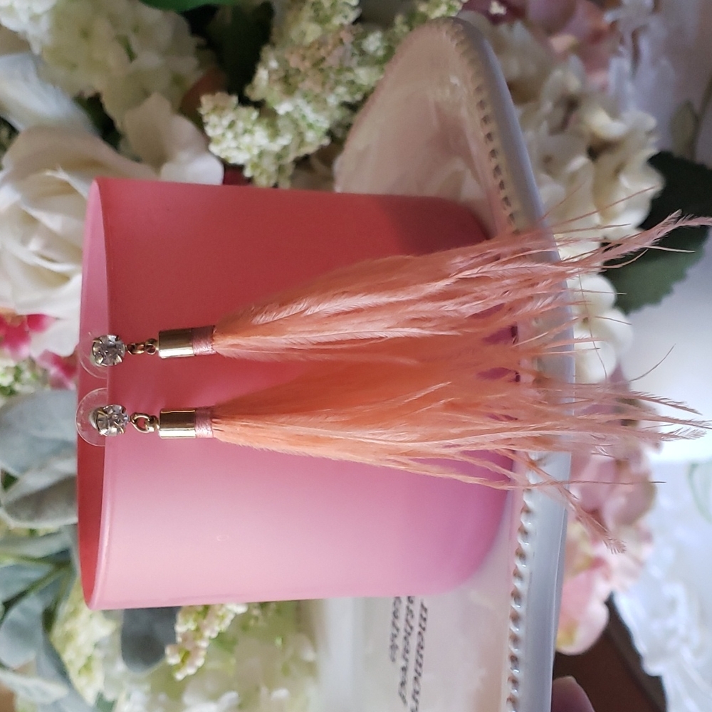 Pink feather statement earings